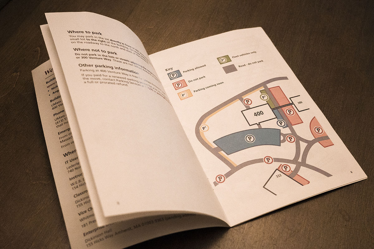 a booklet with a map open on a table